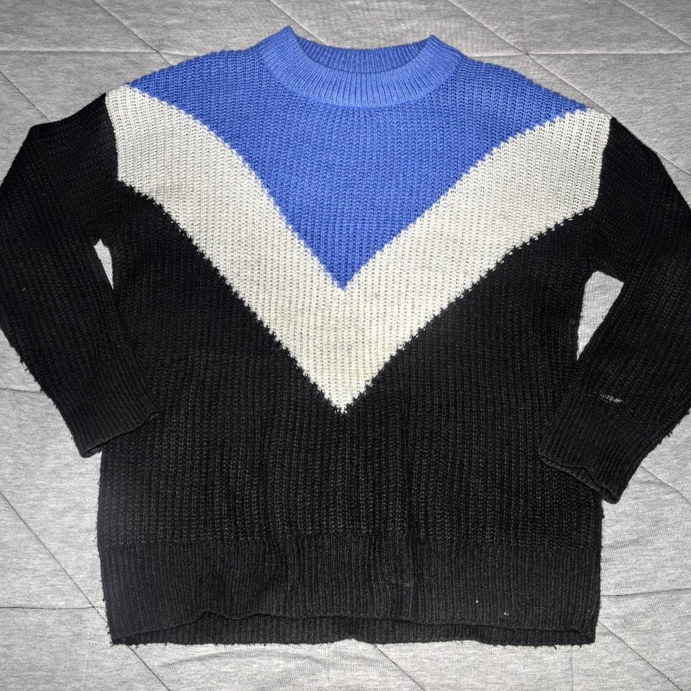Blue, white, and black sweater